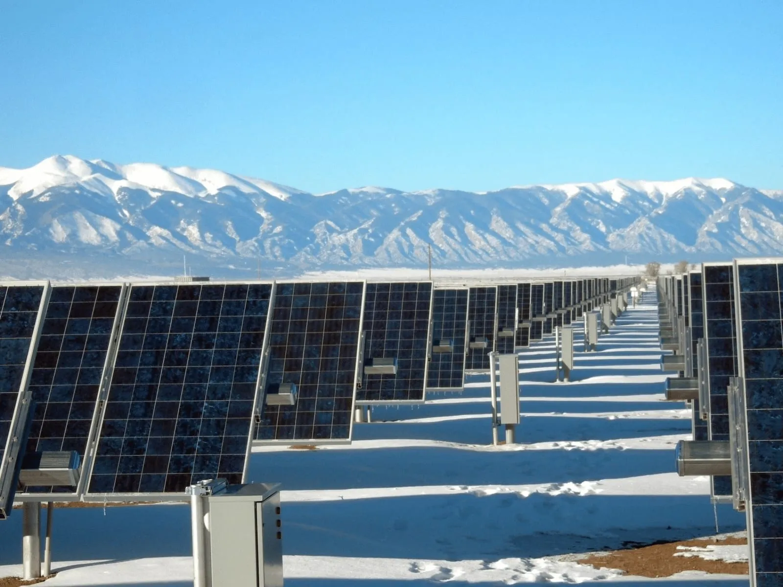 Utility-scale solar array under a clear sky